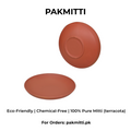Two terracotta plates with text on a white background